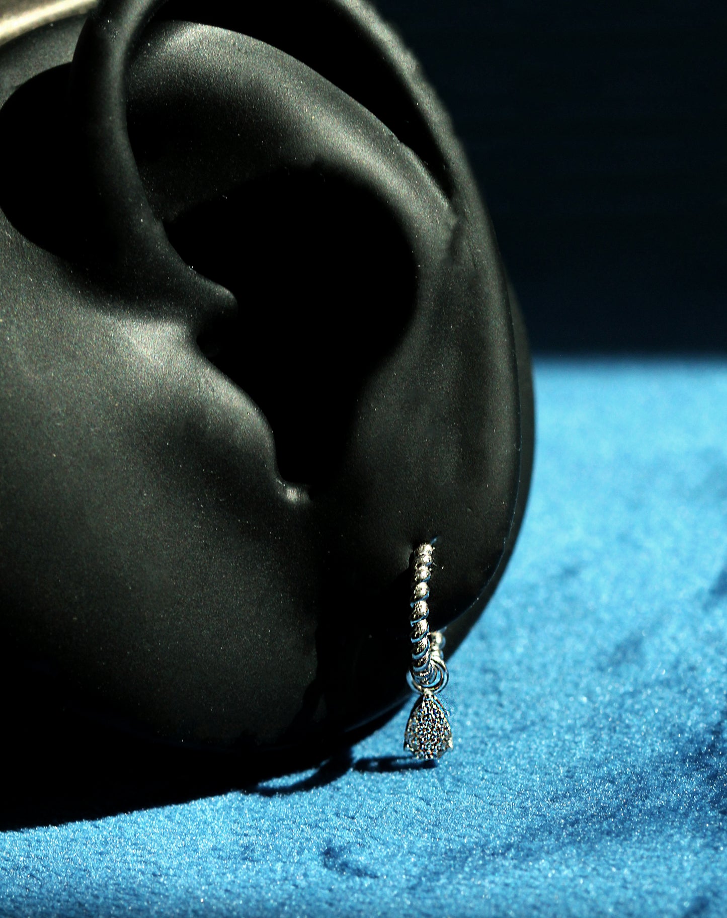 Twisted Hoop with Charm